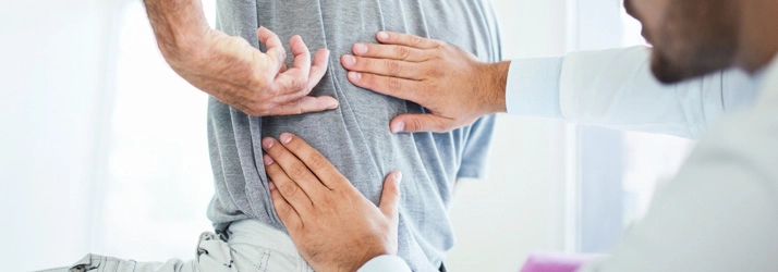 Chiropractic Bowie MD Back Exam Man